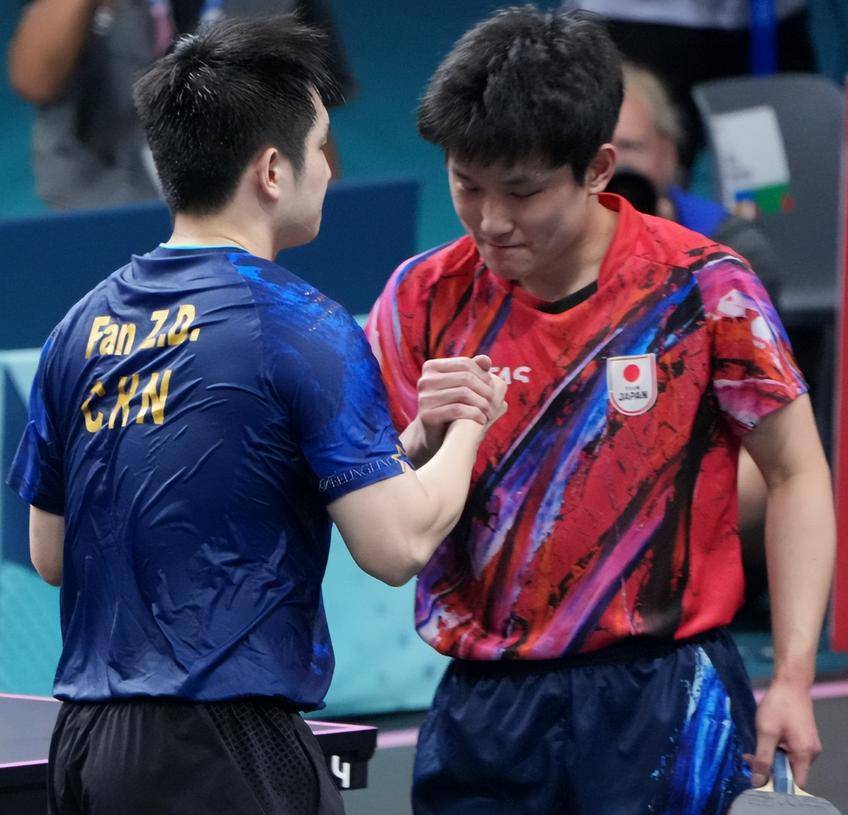 关于中国队险胜日本队，张本智和高光表现的信息